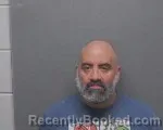 Mugshot of R I Arellano booked in Bexar County, Texas on September 30, 2026