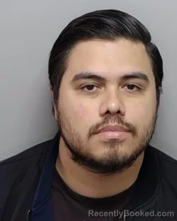 Mugshot of A X Marmolejo booked in Bexar County, Texas on October 2, 2026