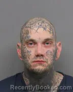 Mugshot of ALEXANDER HUGGINS