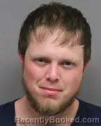 Mugshot of AUSTIN JOHNSON