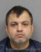 Mugshot of WAEL ALROOMI