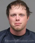 Mugshot of AUSTIN JOHNSON