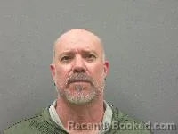 Mugshot of Charles Winford Adams