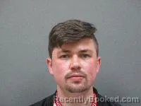 Mugshot of Garrett Matthew Pogrmich booked in Lincoln County, Nebraska on May 10, 2026