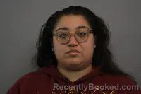 Mugshot of Rashidie Michelle Monzon booked in Madison County, Nebraska on April 13, 2026