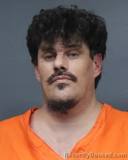 Mugshot of ROMAN BRADY LAW booked in Bowie County, Texas on May 21, 2026