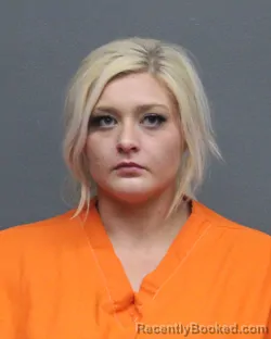 Mugshot of TAYLOR NICOLE HENRY booked in Bowie County, Texas on June 14, 2026