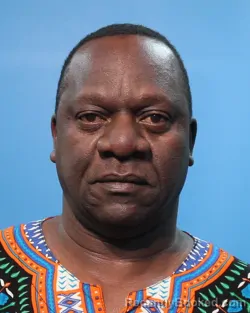 Mugshot of Victor Edmonds Rweyemamu