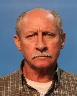 Mugshot of Henry Miles Toney