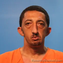 Mugshot of Carlos Lee Simon