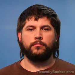 Mugshot of JUSTIN JOSEPH DE LA RUA