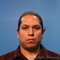 Mugshot of Asahelt Olguin-Melo booked in Brazoria County, Texas on April 2, 2026