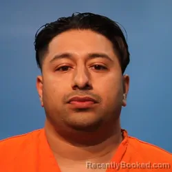 Mugshot of Antonio Rene Flores booked in Brazoria County, Texas on April 6, 2026