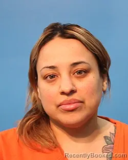 Mugshot of JENNIFER ISABEL RIVERA booked in Brazoria County, Texas on May 9, 2026