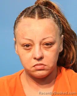 Mugshot of Erica Hernandez Sanjuan booked in Brazoria County, Texas on August 7, 2026