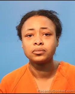 Mugshot of Unique Ogunkoya booked in Brazoria County, Texas on August 12, 2026