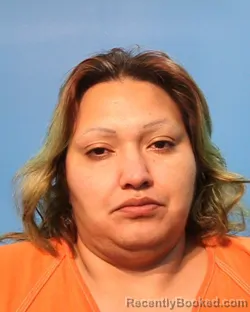 Mugshot of Perla Berenis Paz booked in Brazoria County, Texas on August 23, 2026
