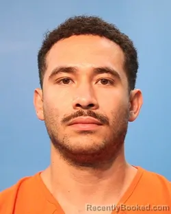 Mugshot of Adam Flores booked in Brazoria County, Texas on October 1, 2026