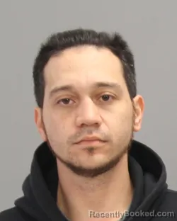 Mugshot of RAMIRO JONATHAN MENDOZA