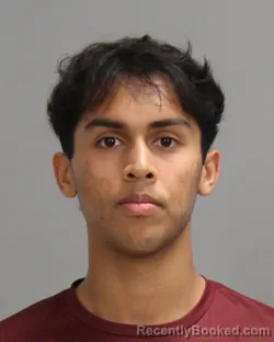 Mugshot of SANJAY KARTHIK