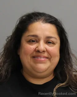 Mugshot of RICARDA MEDINA booked in Brazos County, Texas on March 27, 2026