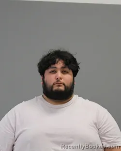 Mugshot of JACOB NATHANIEL FLORES booked in Brazos County, Texas on April 1, 2026