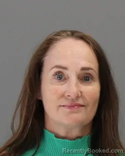 Mugshot of JENNIFER GAY QUINTUS booked in Brazos County, Texas on April 1, 2026