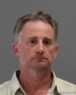 Mugshot of JOHN THOMAS RHODES booked in Brazos County, Texas on April 9, 2026