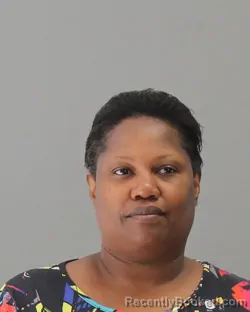 Mugshot of ANGELA SCHERRIE AYERS booked in Brazos County, Texas on April 22, 2026