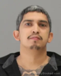Mugshot of JUAN MIGUEL TIRADO booked in Brazos County, Texas on April 25, 2026