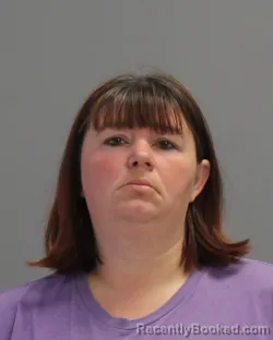 Mugshot of KIMBERLY LYNN PHILLIPS booked in Brazos County, Texas on April 26, 2026