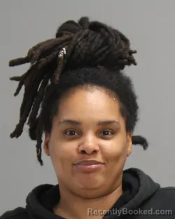 Mugshot of DOMINIQUE LATOYA CURLEY booked in Brazos County, Texas on April 29, 2026