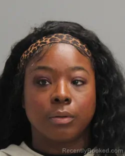 Mugshot of TEMISIA FRENCHSHAY CURLEY booked in Brazos County, Texas on April 29, 2026