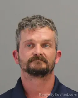 Mugshot of DUSTIN DEWAYNE MANSEL booked in Brazos County, Texas on May 4, 2026