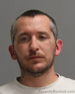 Mugshot of GEOFFREY CHARLES HOLCOMBE booked in Brazos County, Texas on May 7, 2026
