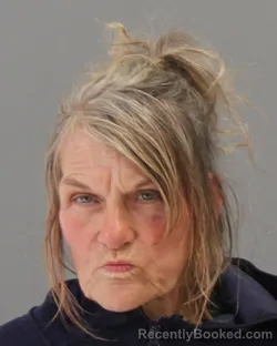 Mugshot of HELEN JOY RUSSELL booked in Brazos County, Texas on May 7, 2026