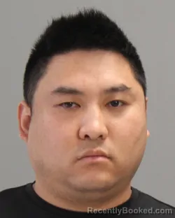 Mugshot of Jialiang Kou booked in Brazos County, Texas on May 7, 2026
