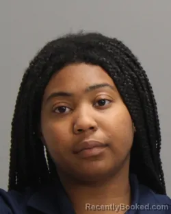 Mugshot of CARLDREUNNA ANNETTE DAVIS booked in Brazos County, Texas on May 8, 2026