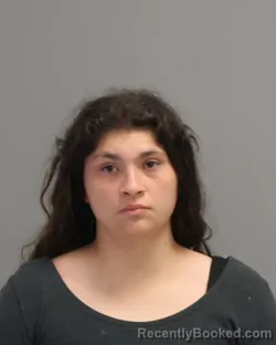 Mugshot of SAVANNAH DENISE AVILA booked in Brazos County, Texas on May 9, 2026