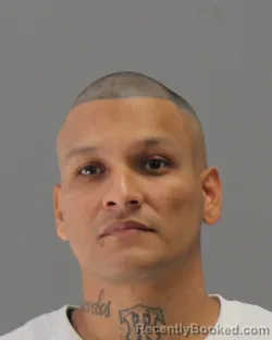 Mugshot of ANDREW CISNEROS booked in Brazos County, Texas on May 13, 2026