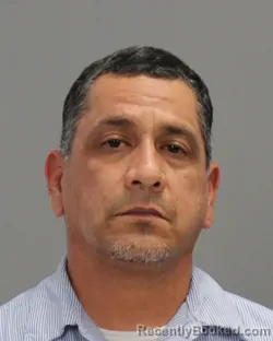 Mugshot of PHILIP GEORGE GARZA booked in Brazos County, Texas on June 18, 2026