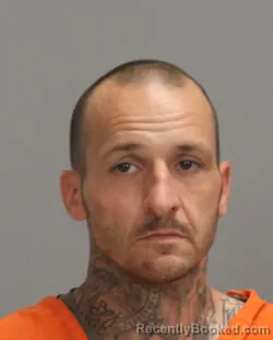Mugshot of JASON MARK AITKEN booked in Brazos County, Texas on June 23, 2026