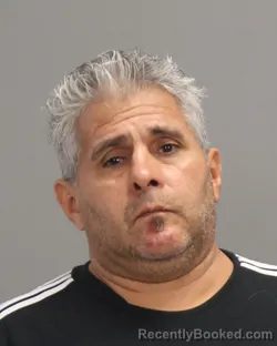 Mugshot of ILDEFONSO ROMERO OLIVAS booked in Brazos County, Texas on June 25, 2026