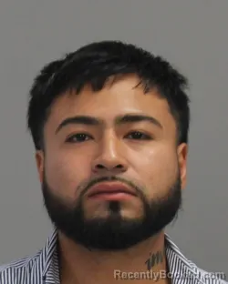 Mugshot of Alberto Alan Alfaro Reyes booked in Brazos County, Texas on June 28, 2026