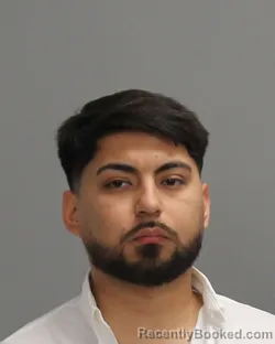 Mugshot of JUAN CARLOS RODRIGUEZ booked in Brazos County, Texas on July 5, 2026