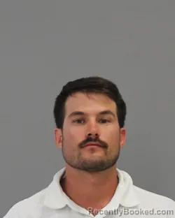 Mugshot of ADAM MICHAEL LUJAN booked in Brazos County, Texas on July 6, 2026