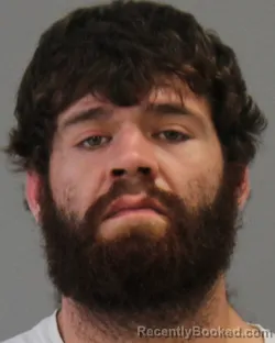 Mugshot of DUSTIN ARNOLD WEISS booked in Brazos County, Texas on July 9, 2026