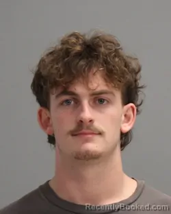 Mugshot of Justin Kenneth Mccarver booked in Brazos County, Texas on August 22, 2026