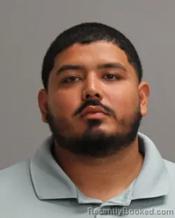 Mugshot of Aaron Mauricio Jimenez booked in Brazos County, Texas on August 23, 2026