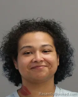 Mugshot of Genie Lynette Juarez-Perez booked in Brazos County, Texas on August 24, 2026
